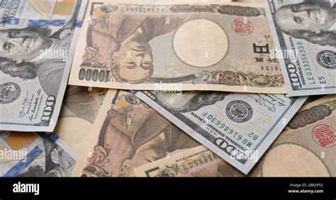 USD and Japanese Yen banknote Stock Photo - Alamy