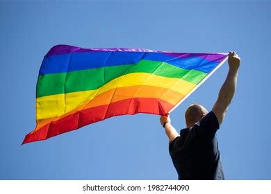 Man Holding Gay Rainbow Flag Over Stock Photo 1982744090 Shutterstock