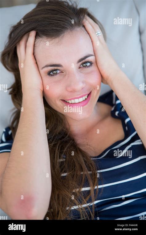 Attractive Brunette Smiling At Camera Stock Photo Alamy