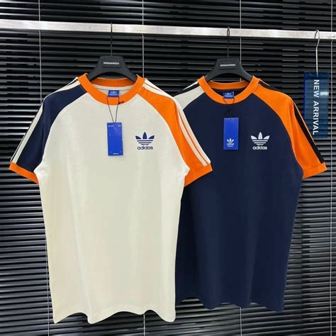 Áo Phông Nam Nữ Adidas thêu logo sọc tay Áo Thun Nam Nữ Premium cotton thoáng mát hot trend