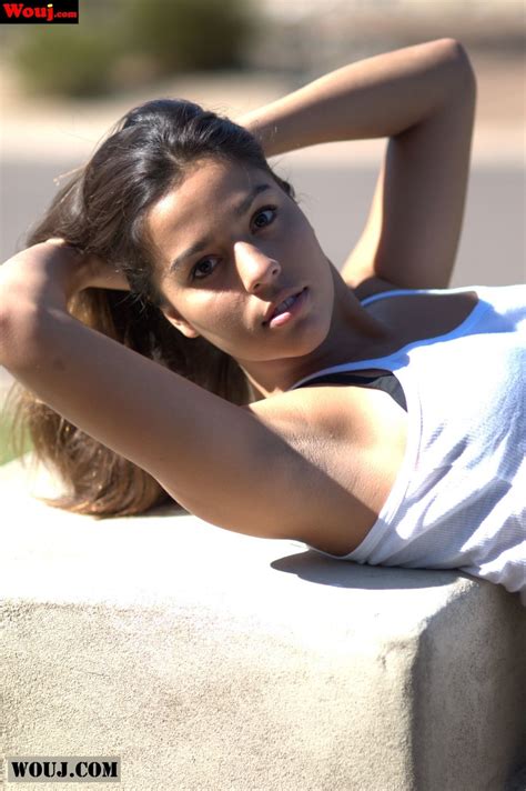 Hot Brunette Babe Shoes Off Her Body In A Sexy Clothed Photoshoot Photos