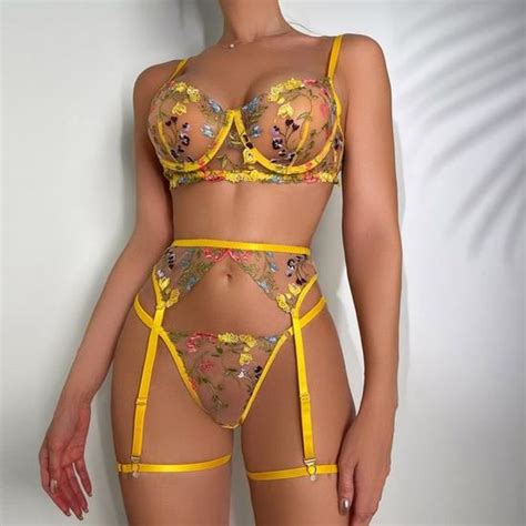 Dames mode Sexy mignon Lingerie creux dentelle fleurs volants Sexy sous vêtements string
