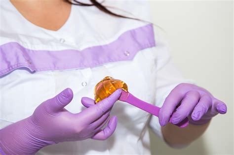 Premium Photo Hot Wax Waxing In The Bowl For Hair Removal Depilation Epilation Procedure