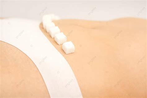 Sugar Cubes On Bikini Line Demonstrate Waxing And Hygiene Photo