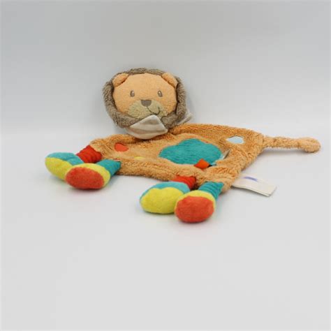 Doudou Plat Lion Orange Bleu Jaune Kiabi Simba Toys