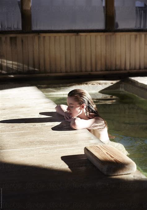 Woman Relaxing At Japanese Spa Hot Springs By Stocksy Contributor Trinette Reed Artofit