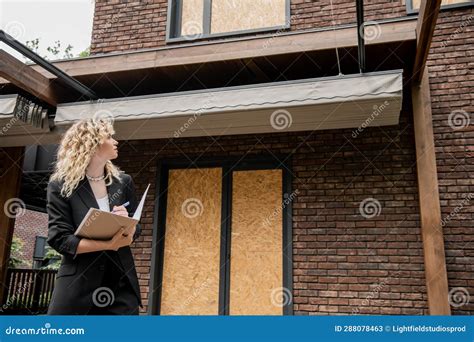 Blonde Real Estate Agent Looking At Stock Image Image Of Business Caucasian