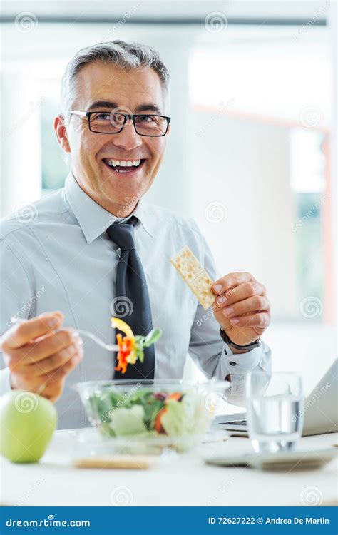 Smiling Businessman Having A Lunch Break Stock Photo Image Of Bowl