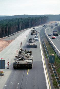 American 3rd Armored Division M-60 tanks, operating on German highway during the Cold War Corps ...