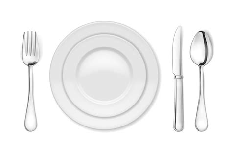 Dinerbord mes vork en lepel geïsoleerd Gratis Vector