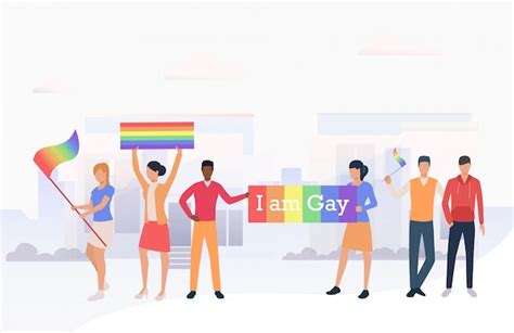 Pessoas segurando bandeiras lgbtq e eu sou bandeira gay em desfile Vetor Grátis