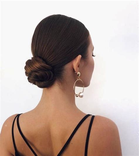 Chignon plaqué on veut un sleek bun la tendance coiffure de la