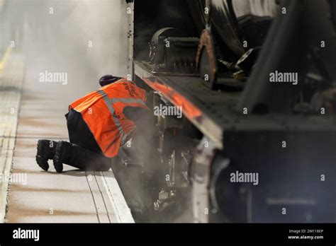 Safety Checks Being Carried Out On Stanier Class 5 Steam Locomotive