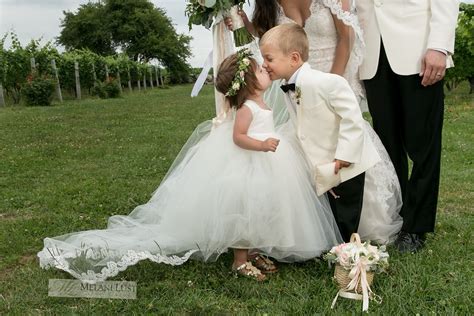 Flower Girl Kissing Boy