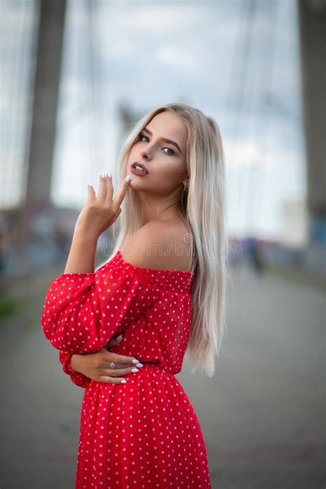 Adorable Blonde Model Wearing Fashionable Red Dress Posing On T Stock Image Image Of
