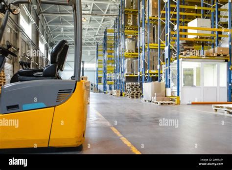 Interior Of A Modern Warehouse With Forklifts Pallet Stacker Truck