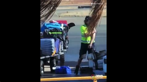 Qantas Baggage Handler Caught Hurling Luggage Youtube