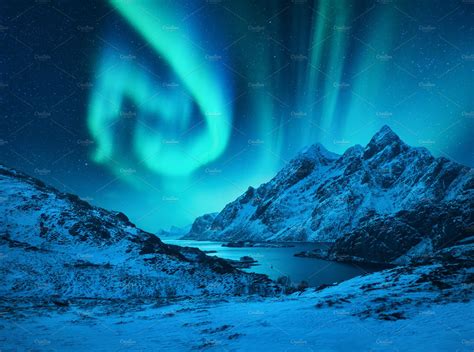 aurora borealis   mountains stock photo  aurora