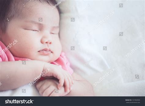 Asian Newborn Baby Girl Sleeping On Stock Photo 721994593 Shutterstock