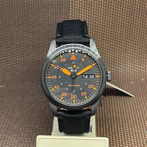 seiko  sports srphk reissue military black orange nylon day date