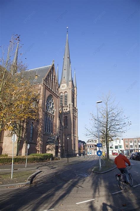 Curch And Bicycle On Street Of Woerden In The Netherlands Photo