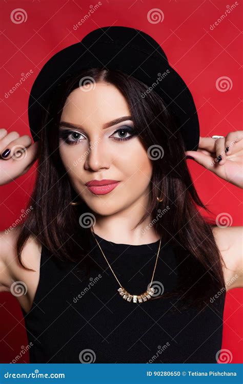 Brunette Woman Posing In Black On Red Background S Stock Photo Image Of Front Fashion 90280650