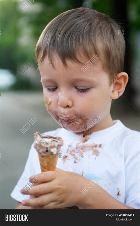 Happy Kid Eating Ice Image & Photo (Free Trial) | Bigstock