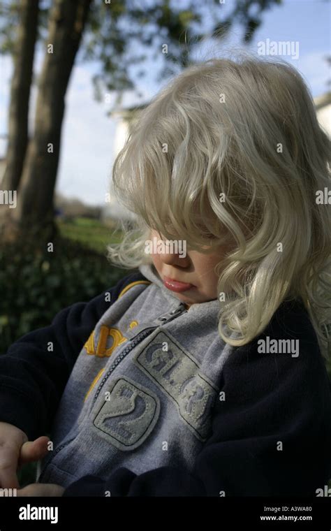 Grumpy Blonde Girl Stock Photo Alamy
