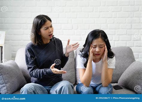 Asian Lesbian Couple Arguing On The Sofa Stock Image Image Of Annoyed Relationship 295228677