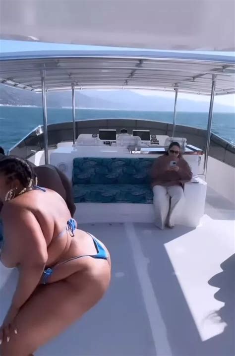 Lizzo Twerks In Tiniest String Bikini Yet During Wild Getaway On Luxury
