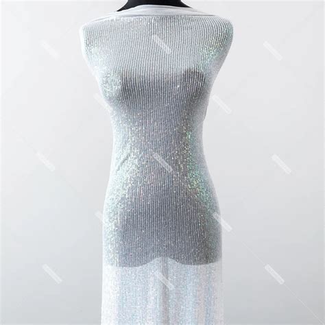 Parallel Line Iridescent White Sequin Stretch Fabric Oneyard