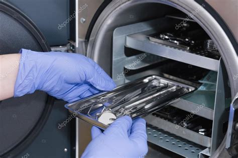 Using Autoclave Sterilizer — Stock Photo © Microgen 115252756