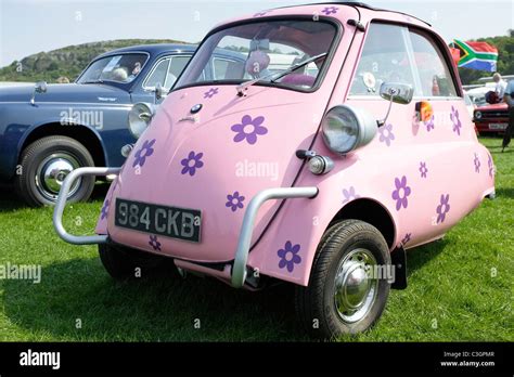 A Funky Flower Power Bmw Isetta Bubble Car In Shocking Pink Stock Photo