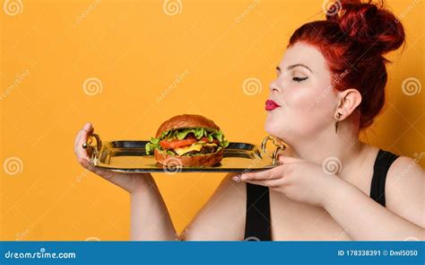 Happy Overweight Fat Woman Happy Hold Burger Cheeseburger Sandwich With