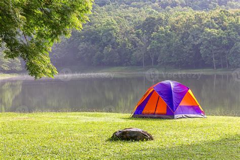 Dome tent camping at lake side 17564560 Stock Photo at Vecteezy