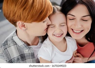 Smiling Same Sex Couple Embracing Kid Stock Photo Shutterstock