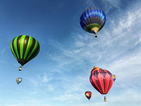 Many Hot Air Balloons Flying Over Trees At Balloons Over Waikato Festival Editorial Photography