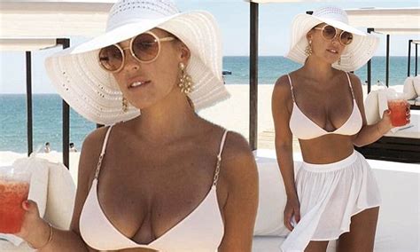 Kate Wright Shows Off Her Cleavage And Bronzed Glow In White Bikini Daily Mail Online