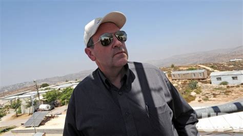 Photo: Former U.S. Presidential candidate Mike Huckabee visits an area ...