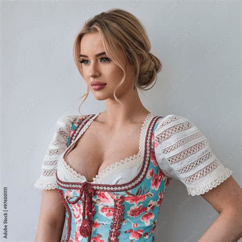 A Busty Blonde Woman Wearing A Traditional Dress With A Floral Pattern The Dress Has A Low Cut