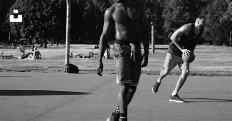 Man Holding Basketball Photo Free City Image On Unsplash