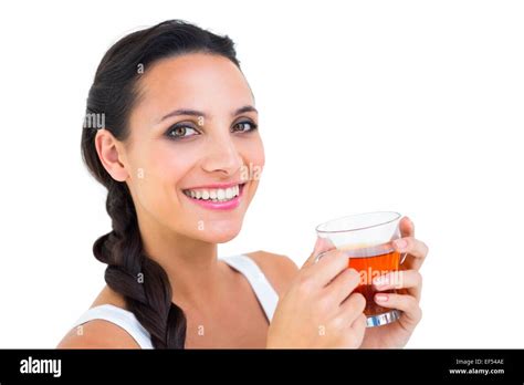 Pretty Brunette Having Cup Of Tea Stock Photo Alamy