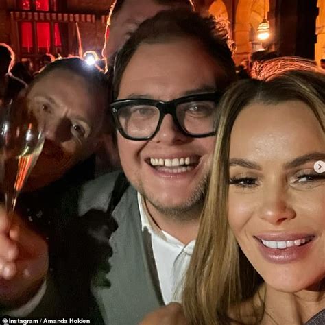 Amanda Holden Flaunts Her Toned Figure In A Tiny Gold Bikini As