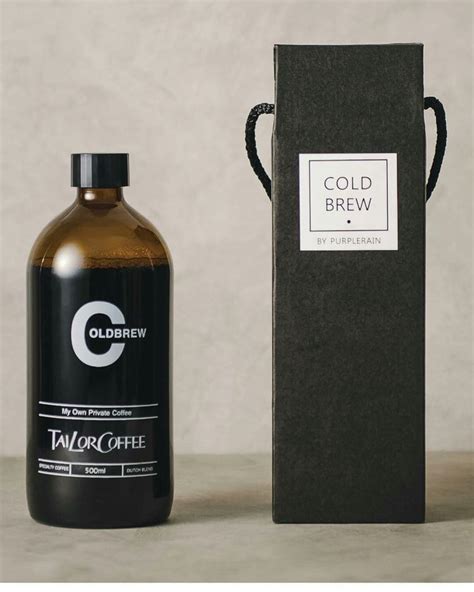 A Bottle Of Cold Brew Next To A Black Box With The Label Coldbrew