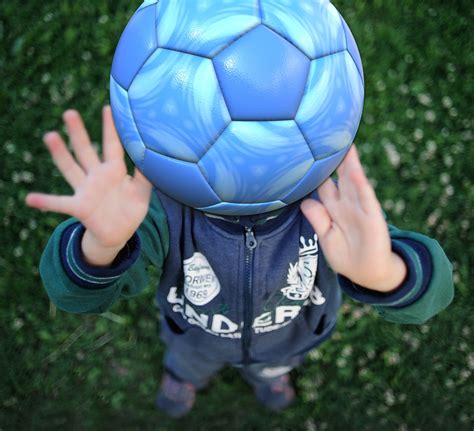 boy throwing soccer ball  stock photo public domain pictures