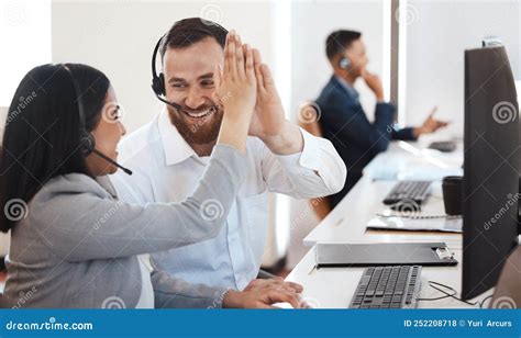 I Cant Believe we Made that Happen. Two Call Centre Agents Giving Each ...