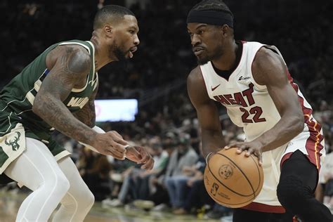 NBA Giannis Antetokounmpo Damian Lillard Help Bucks Hold Off Heat