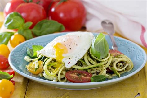 Free Photo Zucchini Noodles With Tomatoes And Egg