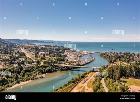 Aerial View Of Chetco River Bridge And Harbor In Brookings Oregon