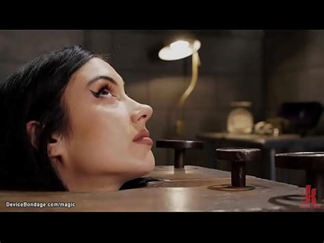 Hot Brunette Slave Jazmin Luv Bound In Bondage Cube With A Neck In Stock Then Bent Over A Wooden